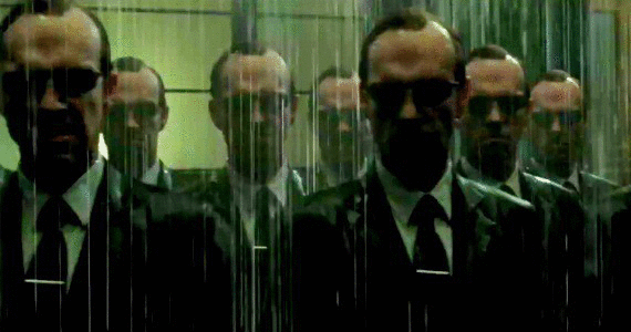 A wall of Agent Smith from The Matrix